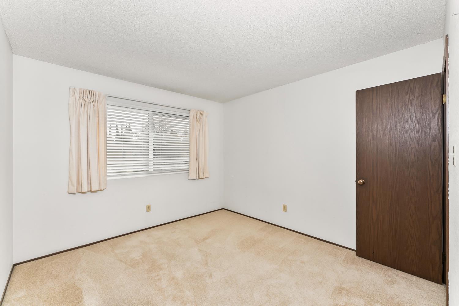 3126 Oxford Road Cameron Park, CA 95682 - Photo 28 of 45 an empty room with windows