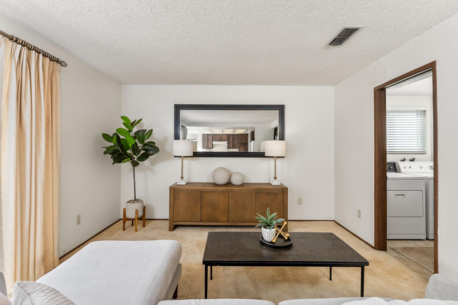 3126 Oxford Road Cameron Park, CA 95682 - Photo 8 of 45 a living room with furniture and a potted plant