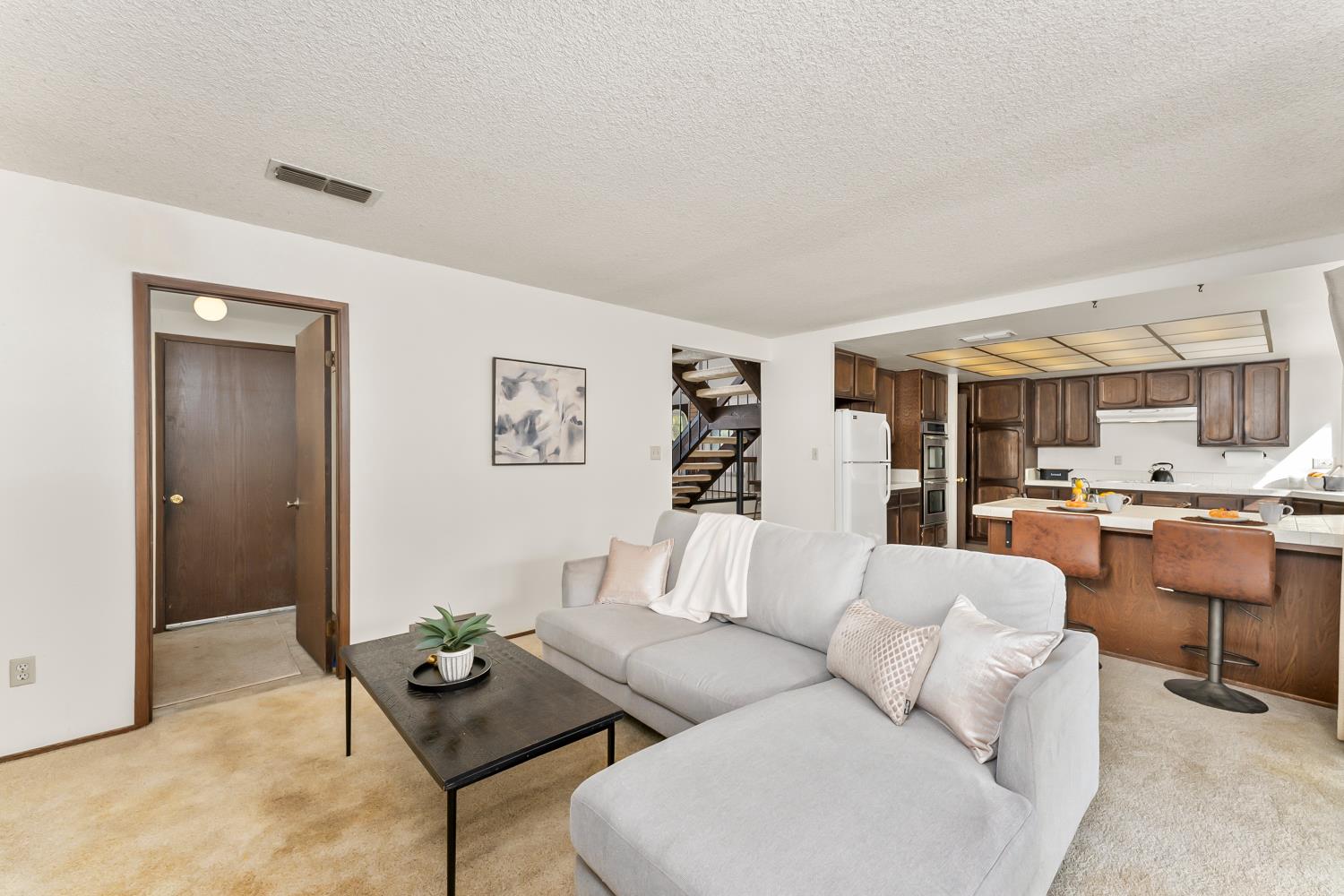 3126 Oxford Road Cameron Park, CA 95682 - Photo 10 of 45 a living room with furniture and view of kitchen