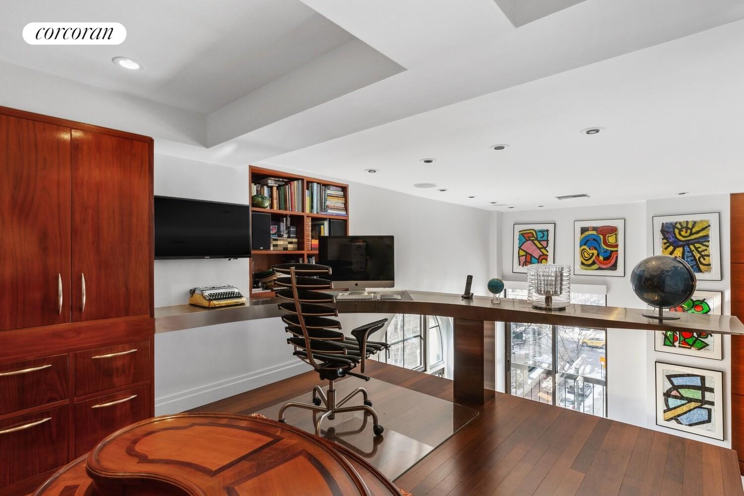 253 West 73rd Street, Unit 5F Manhattan, NY 10023 - Photo 13 of 19 a living room with furniture and flat screen tv
