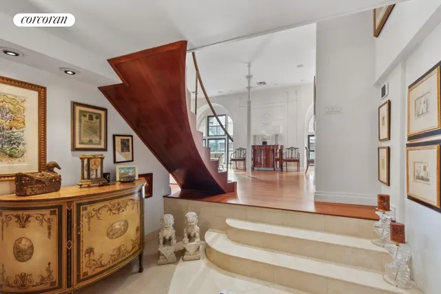 a view of entryway livingroom and hall