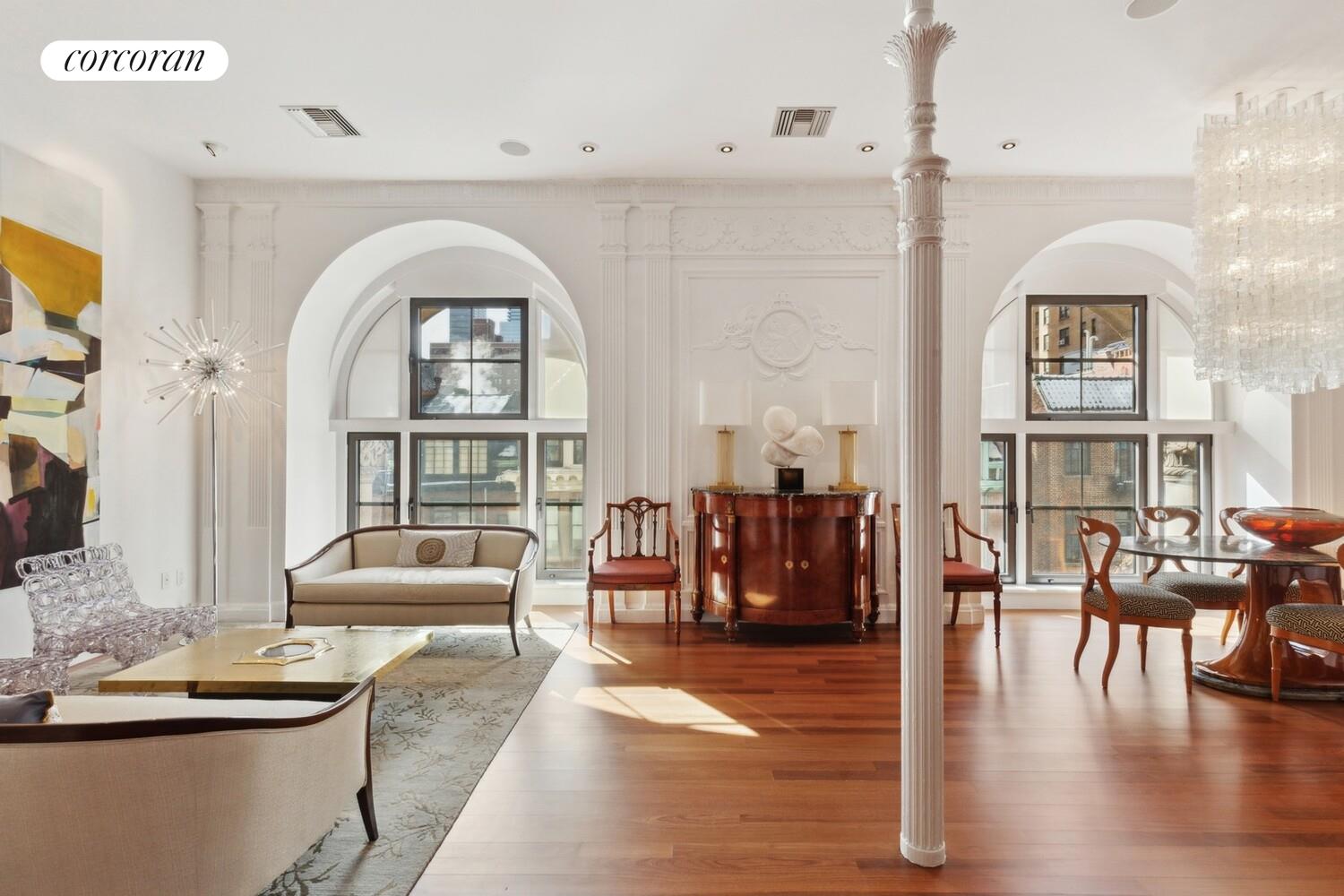 253 West 73rd Street, Unit 5F Manhattan, NY 10023 - Photo 4 of 19 a living room with fireplace furniture and a large window