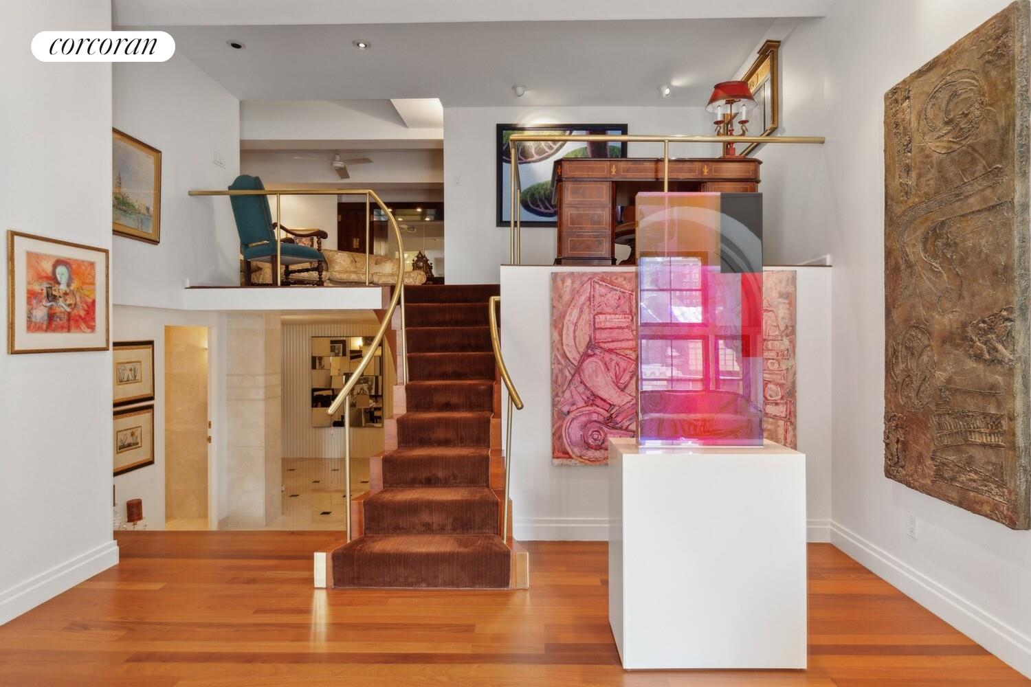 253 West 73rd Street, Unit 5F Manhattan, NY 10023 - Photo 5 of 19 a view of a living room with furniture and wooden floor
