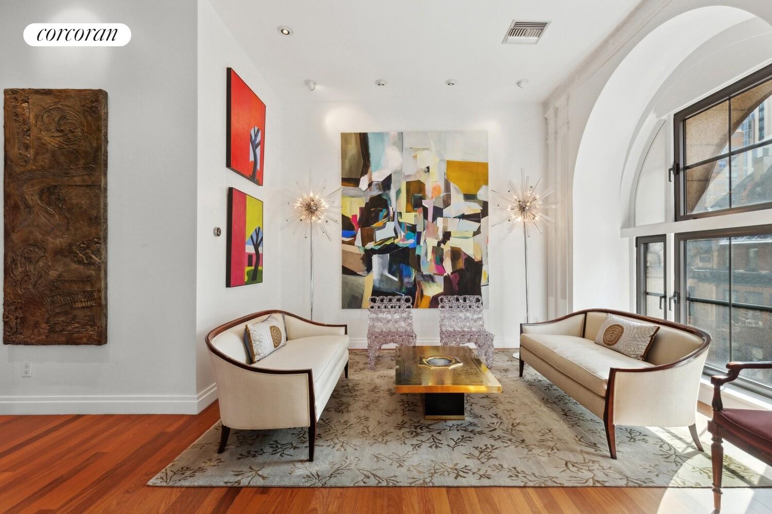 253 West 73rd Street, Unit 5F Manhattan, NY 10023 - Photo 6 of 19 a living room with furniture and a window