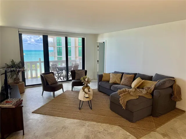 a bathroom with a toilet and a bath tub