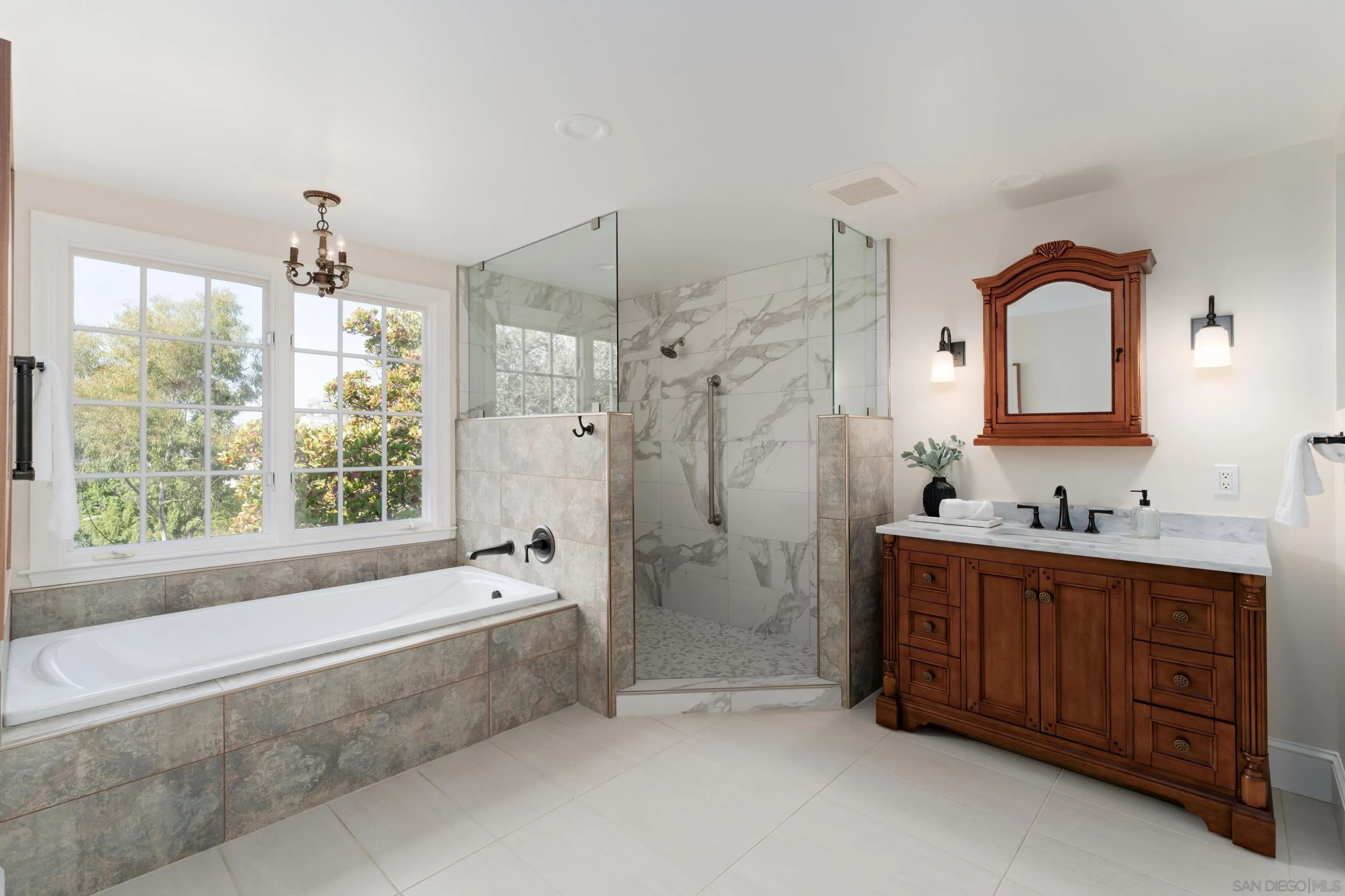 1506 Plumosa Way San Diego, CA 92103 - Photo 12 of 30 a spacious bathroom with sink shower bathtub and window