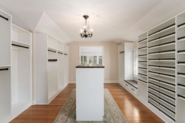 a view of a hallway with a white walls