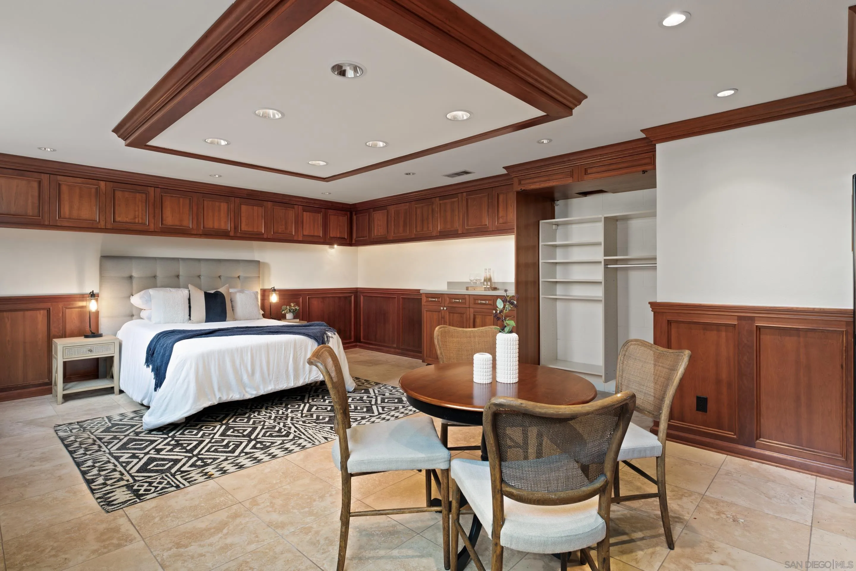 1506 Plumosa Way San Diego, CA 92103 - Photo 18 of 30 a bedroom with a bed and wooden floor