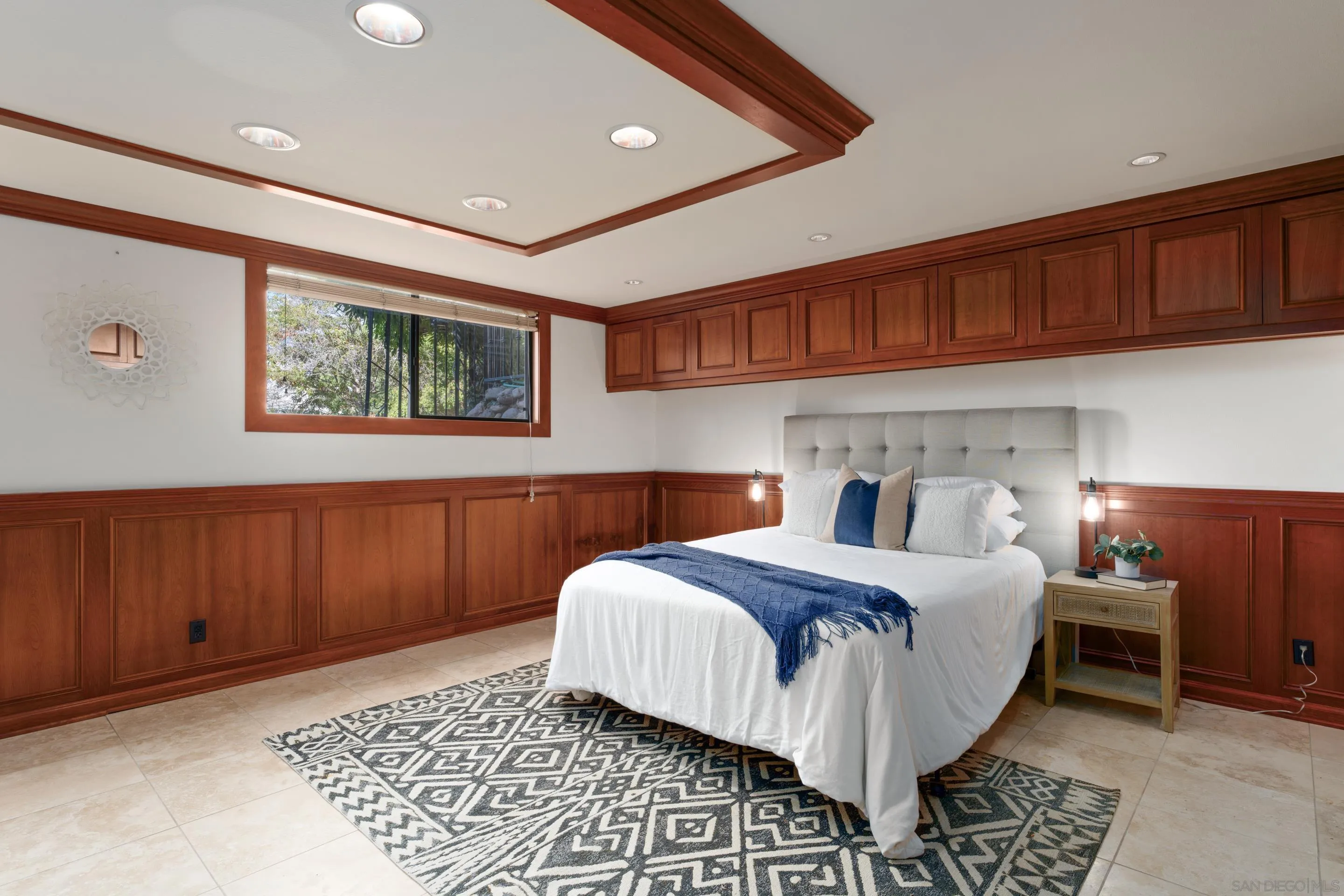 1506 Plumosa Way San Diego, CA 92103 - Photo 19 of 30 a bedroom with a large bed and a window