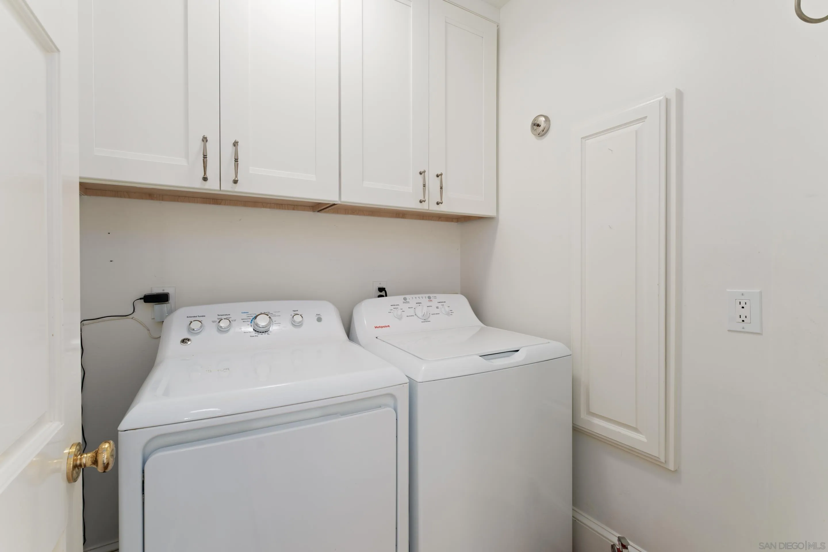 1506 Plumosa Way San Diego, CA 92103 - Photo 21 of 30 a utility room with dryer and washer