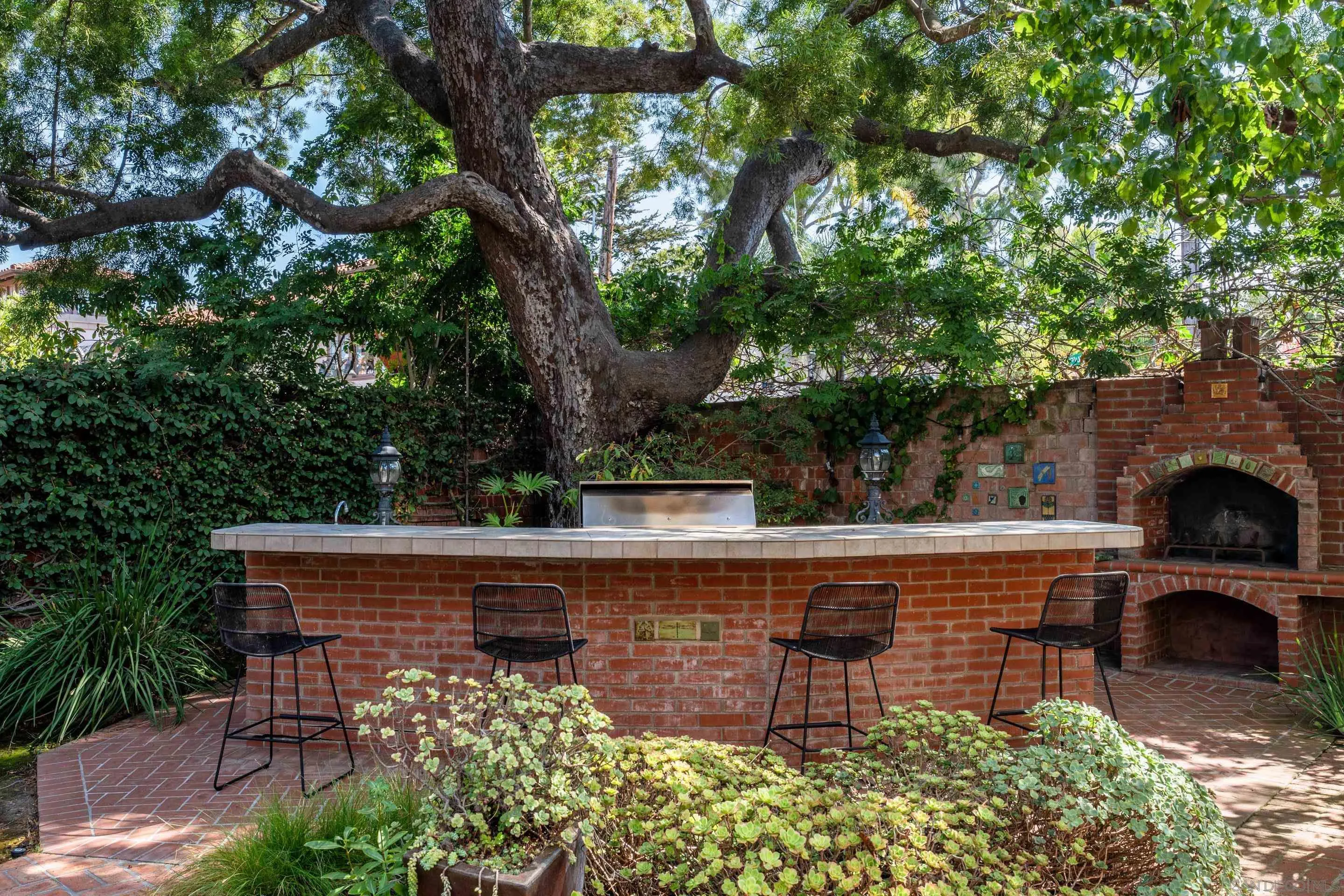 1506 Plumosa Way San Diego, CA 92103 - Photo 23 of 30 a view of a chairs and table in the patio