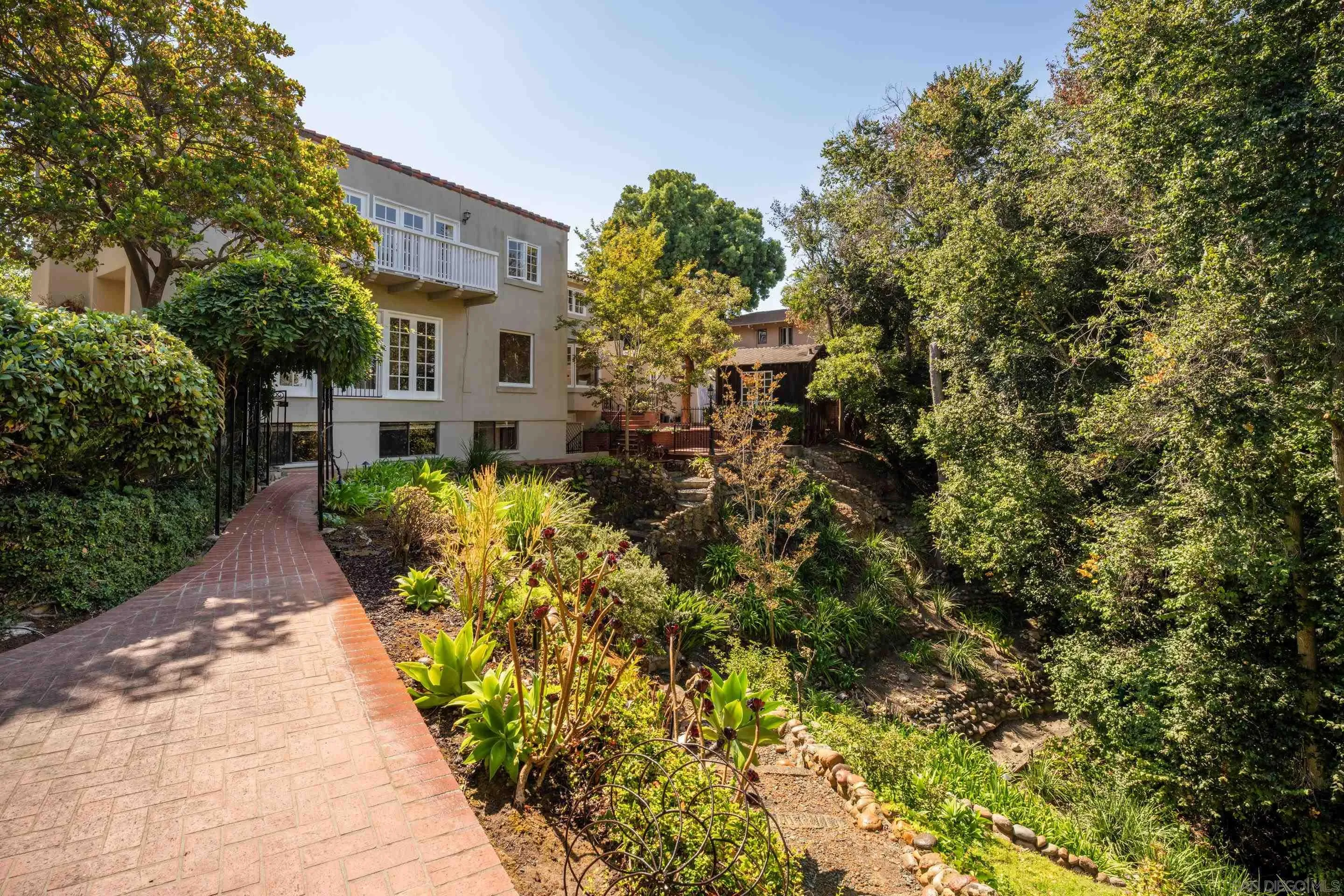 1506 Plumosa Way San Diego, CA 92103 - Photo 25 of 30 a front view of a house with a yard