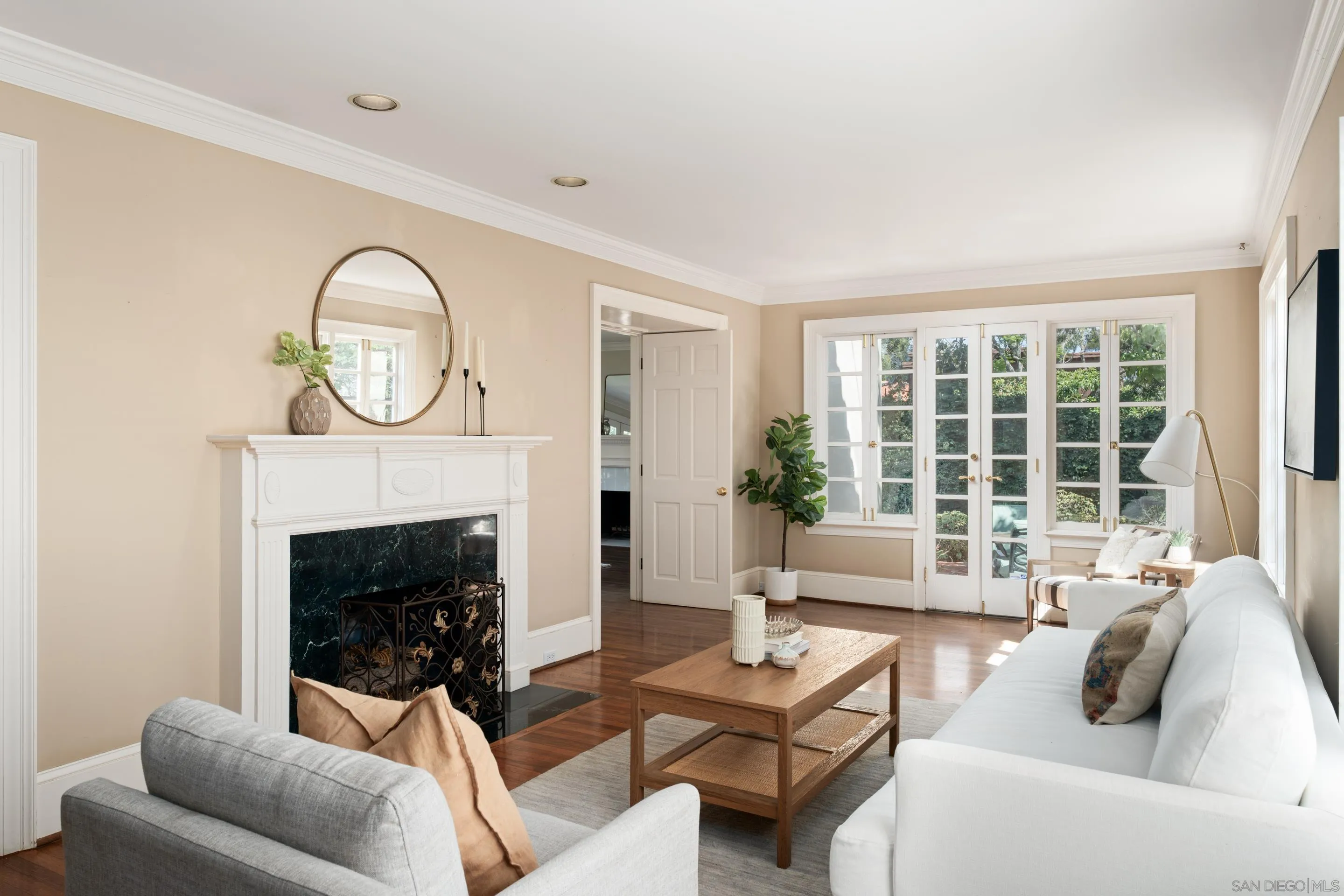 1506 Plumosa Way San Diego, CA 92103 - Photo 3 of 30 a living room with furniture a window and a fireplace