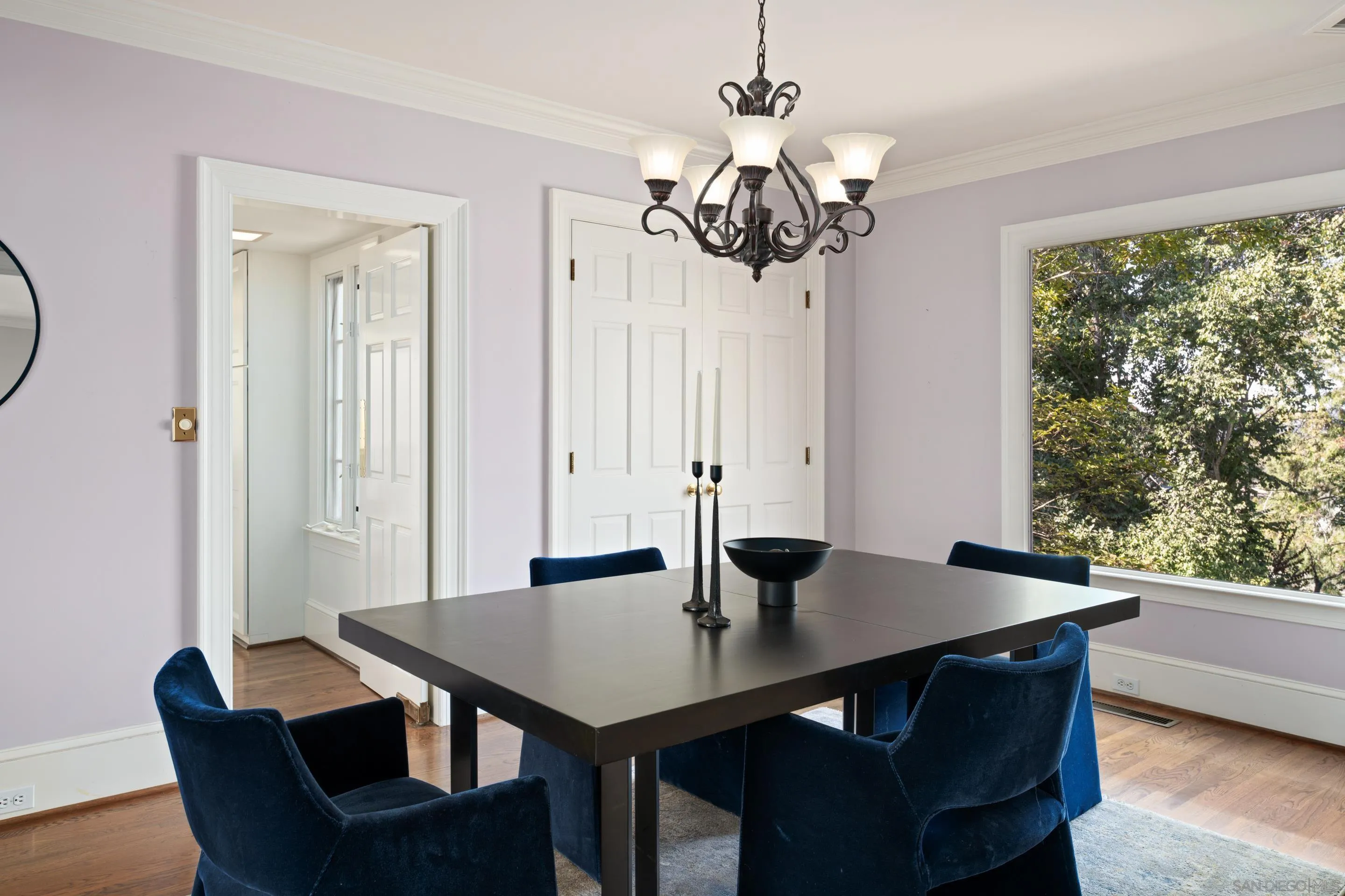 1506 Plumosa Way San Diego, CA 92103 - Photo 6 of 30 a view of a dining room with a table and chairs