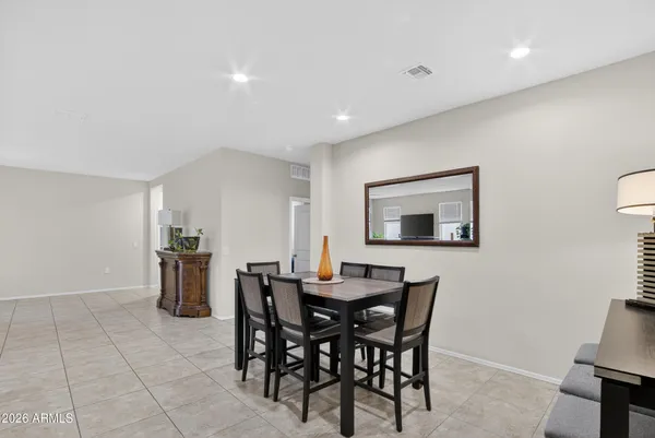 a view of a dining room with furniture