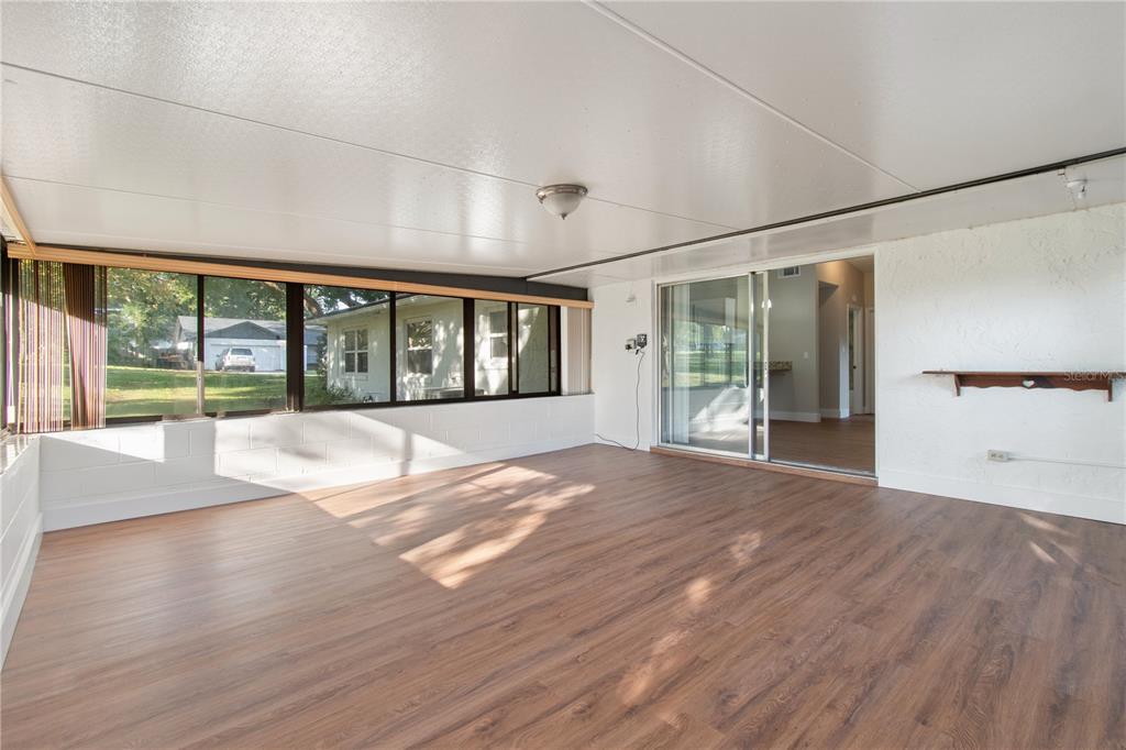 304 Barclay Avenue Altamonte Springs, FL 32701 - Photo 25 of 29 a view of empty room with wooden floor and fan
