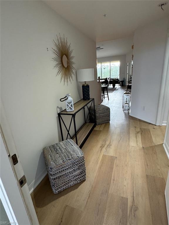 4650 Yacht Harbor Drive, Unit 132 Naples, FL 34112 - Photo 3 of 22 a living room with furniture and a couch