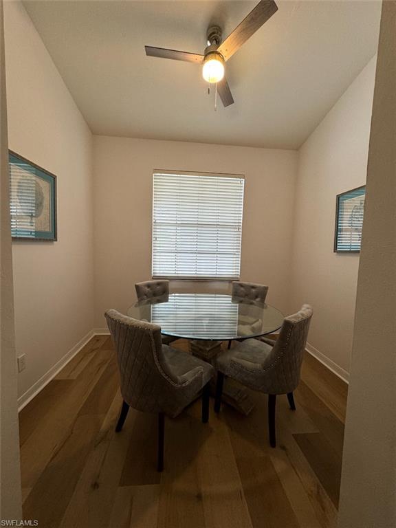 4650 Yacht Harbor Drive, Unit 132 Naples, FL 34112 - Photo 6 of 22 a view of a dining room with furniture and window
