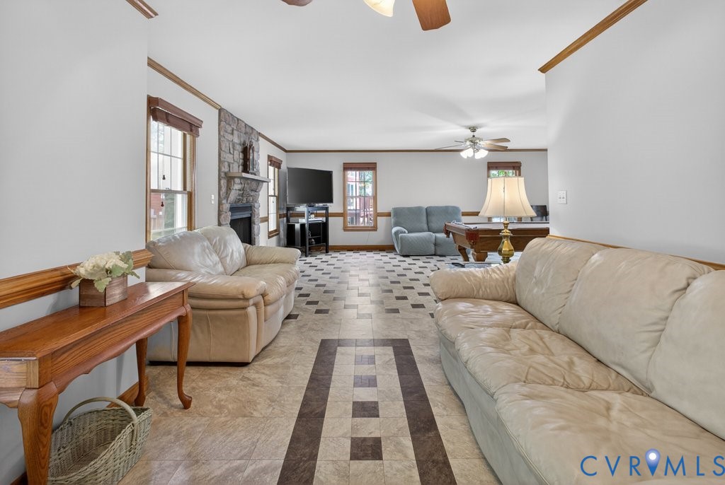 173 Covenant Way Bumpass, VA 23024 - Photo 19 of 55 Spacious living area featuring patterned tile floo