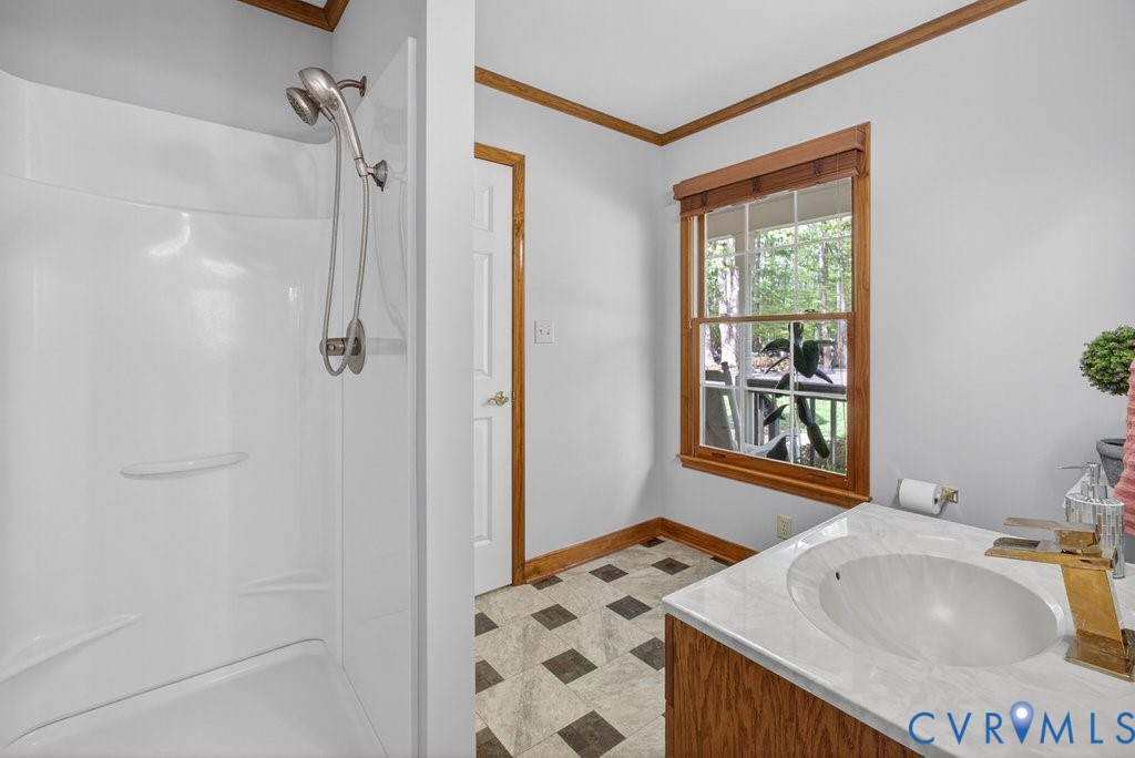 173 Covenant Way Bumpass, VA 23024 - Photo 22 of 55 a bathroom with a sink and a bathtub