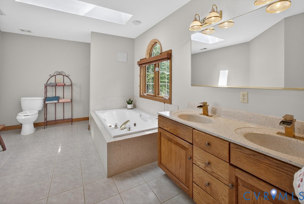 173 Covenant Way Bumpass, VA 23024 - Photo 32 of 55 Bathroom featuring a large vanity with dual sinks,