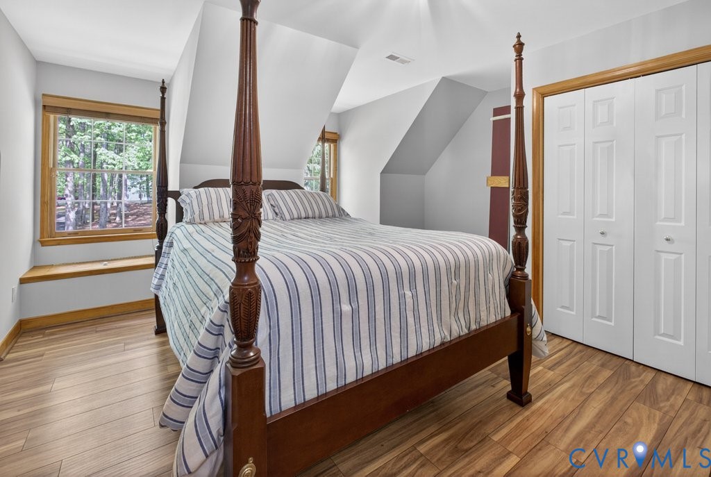 173 Covenant Way Bumpass, VA 23024 - Photo 37 of 55 This room features wood flooring, a window with a