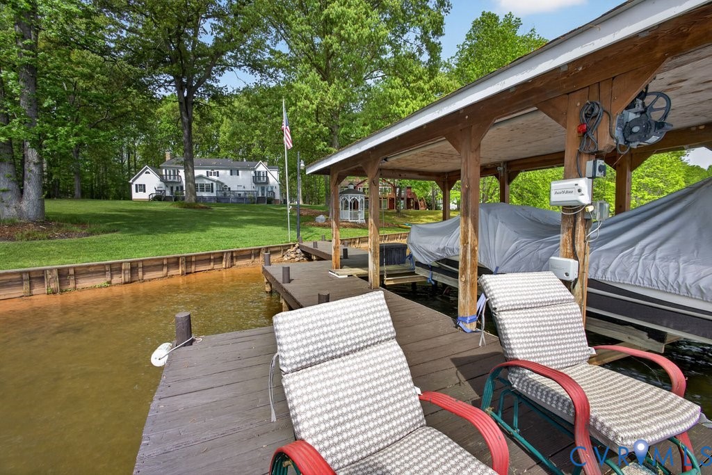 173 Covenant Way Bumpass, VA 23024 - Photo 44 of 55 a view of a patio with swimming pool table and chairs