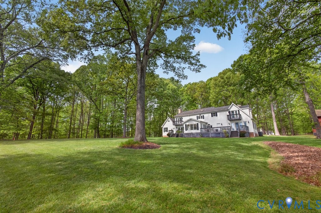 173 Covenant Way Bumpass, VA 23024 - Photo 45 of 55 The property features a spacious lawn surrounded b