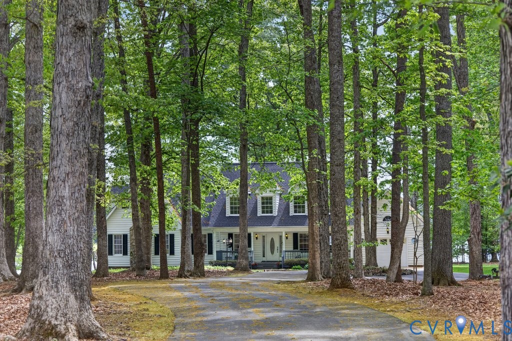 173 Covenant Way Bumpass, VA 23024 - Photo 50 of 55 The property is set back from a paved driveway, su