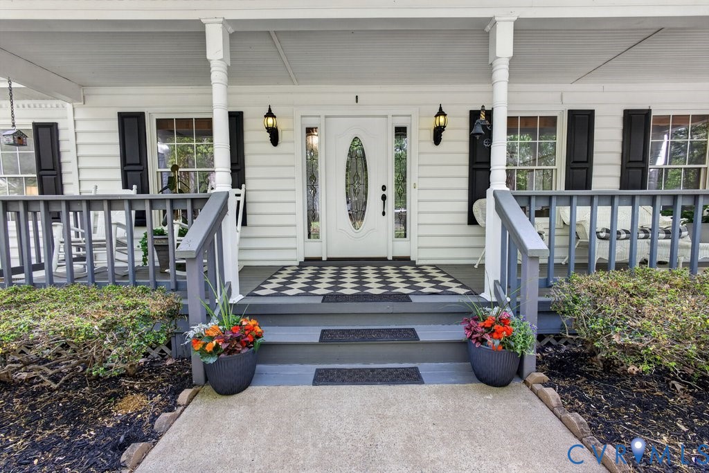 173 Covenant Way Bumpass, VA 23024 - Photo 5 of 55 Inviting front porch featuring a checkered pattern