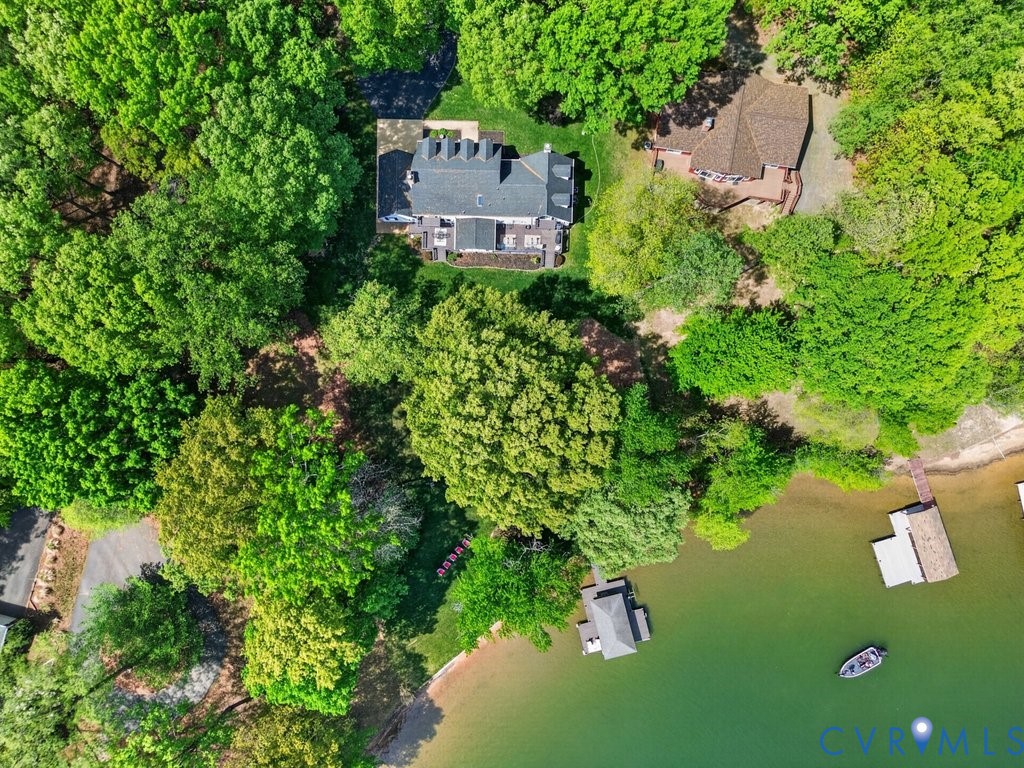 173 Covenant Way Bumpass, VA 23024 - Photo 51 of 55 an aerial view of a house with a yard and lake view