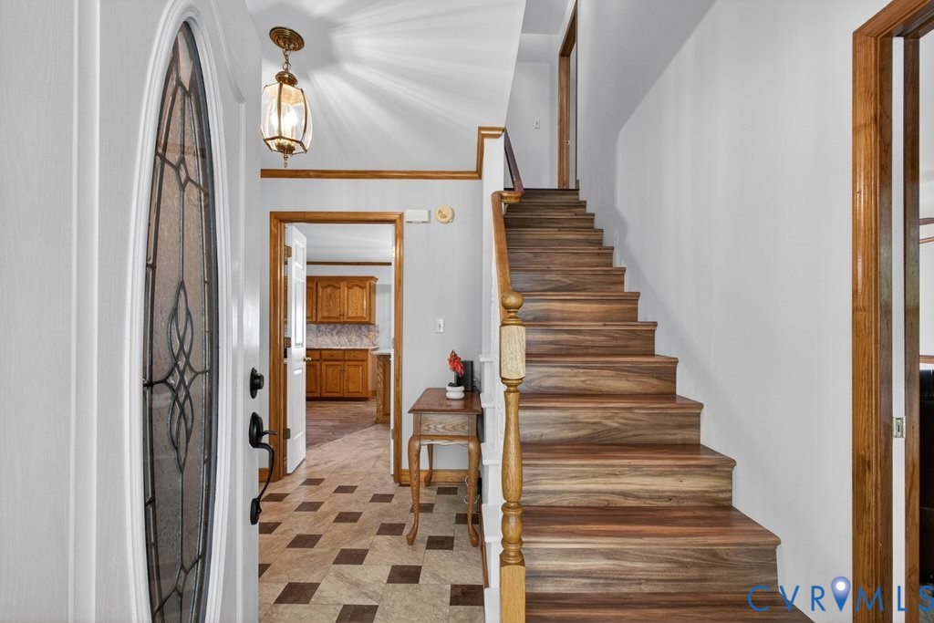 173 Covenant Way Bumpass, VA 23024 - Photo 7 of 55 The welcoming entryway features a decorative glass