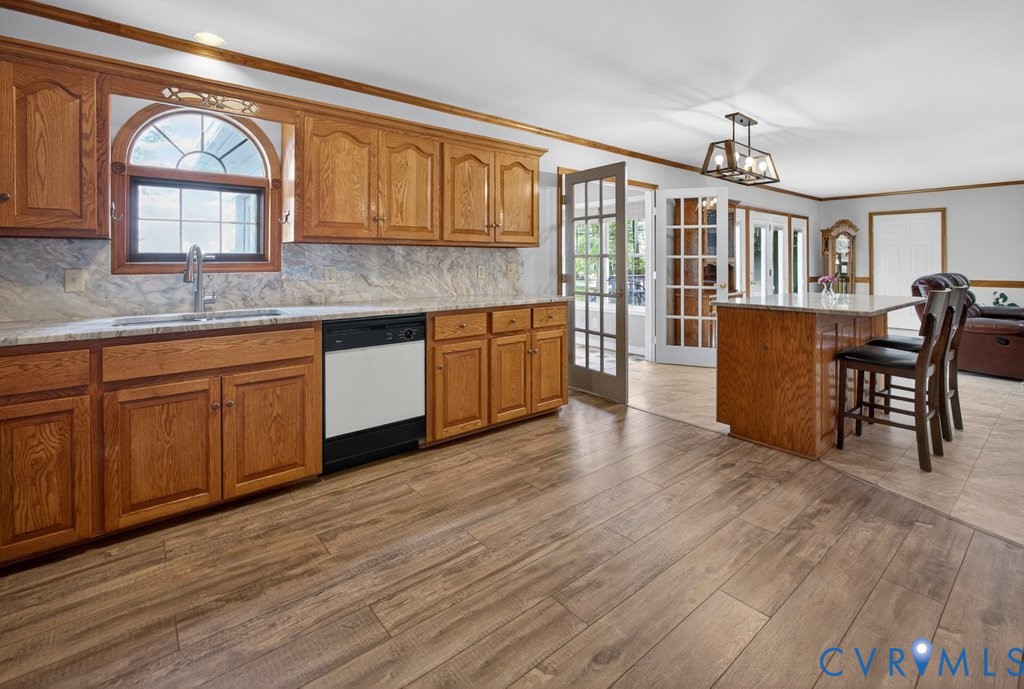 173 Covenant Way Bumpass, VA 23024 - Photo 9 of 55 Well-appointed kitchen featuring wood cabinetry, g
