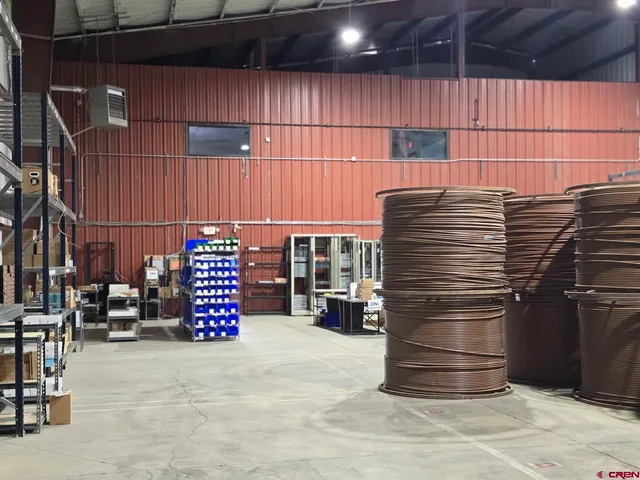 a room with furniture and a flat screen tv