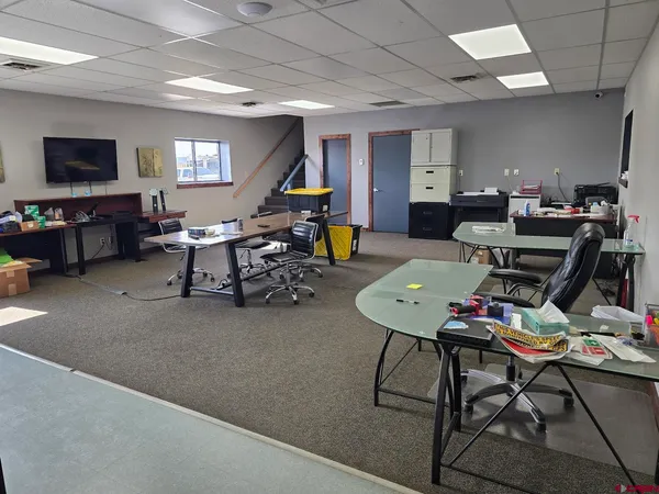 a kitchen with counter top space and appliances