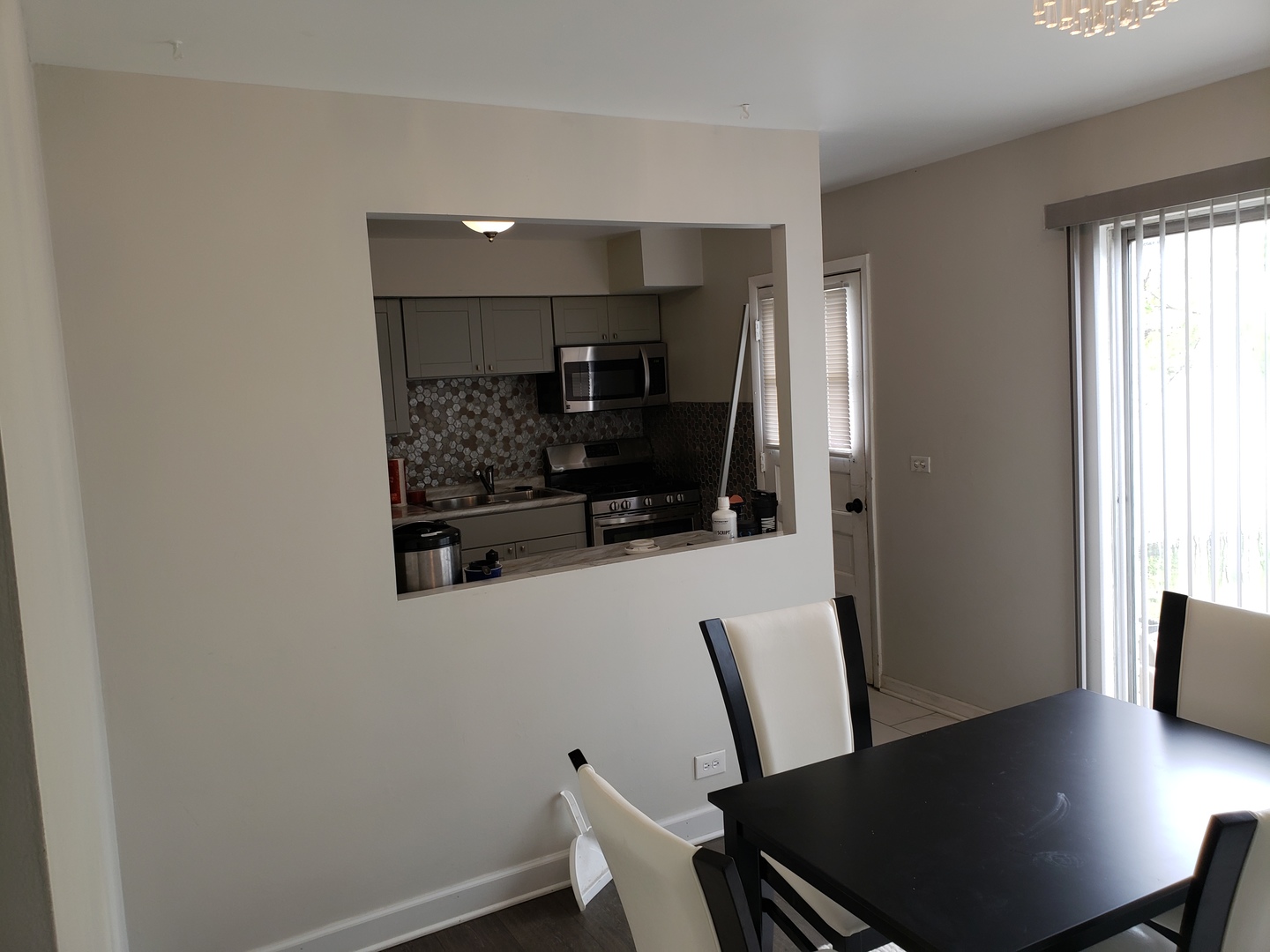 952 Virginia Lane Elmhurst, IL 60126 - Photo 2 of 11 a view of kitchen with cabinets and wooden floor