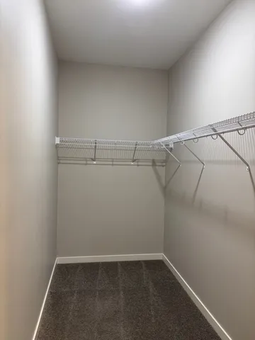 a view of a room with racks on the wall