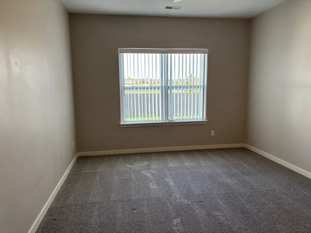 an empty room with a window
