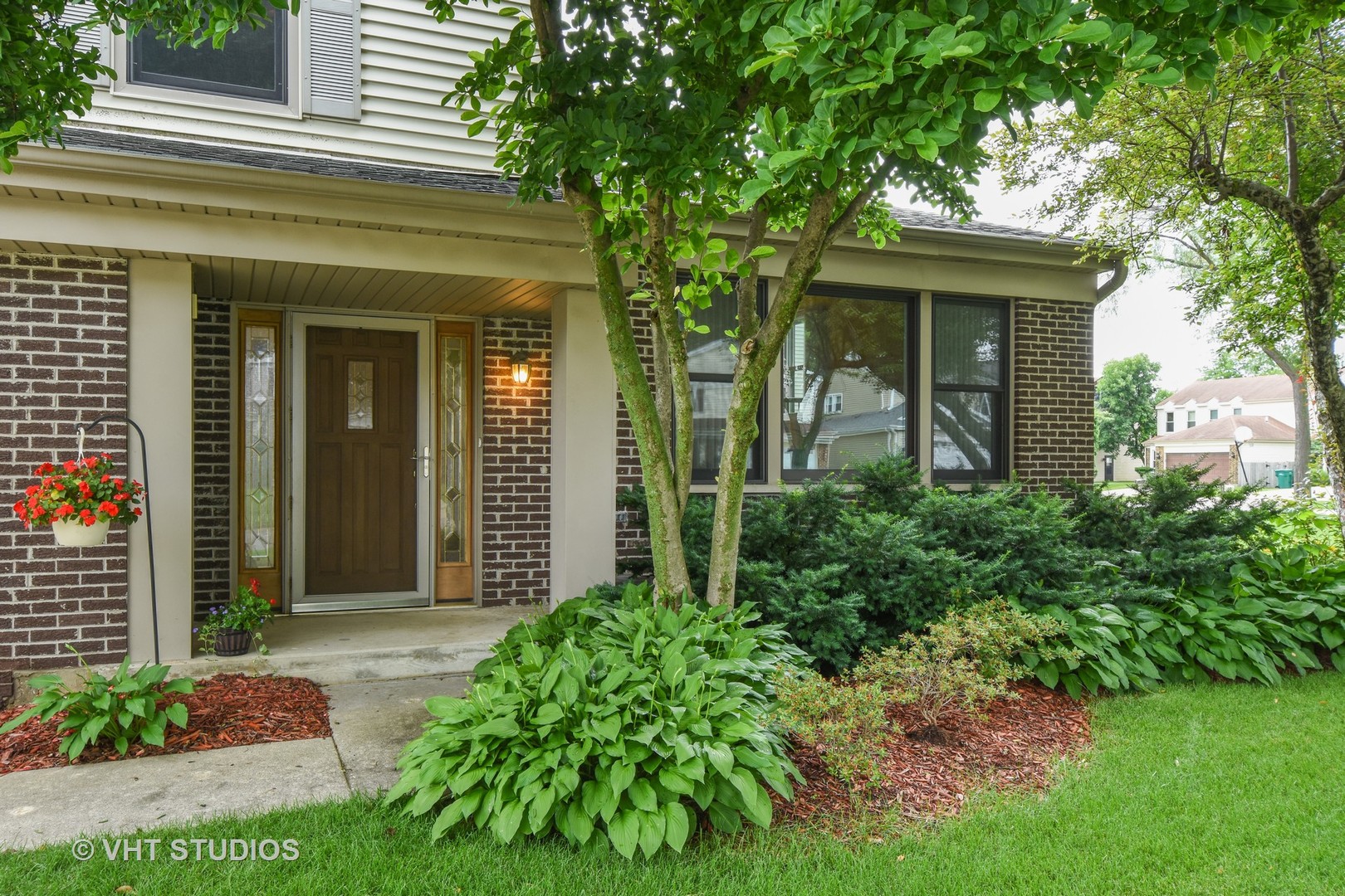 1320 Devonshire Road Buffalo Grove, IL 60089 - Photo 24 of 25 front view of a house with a yard