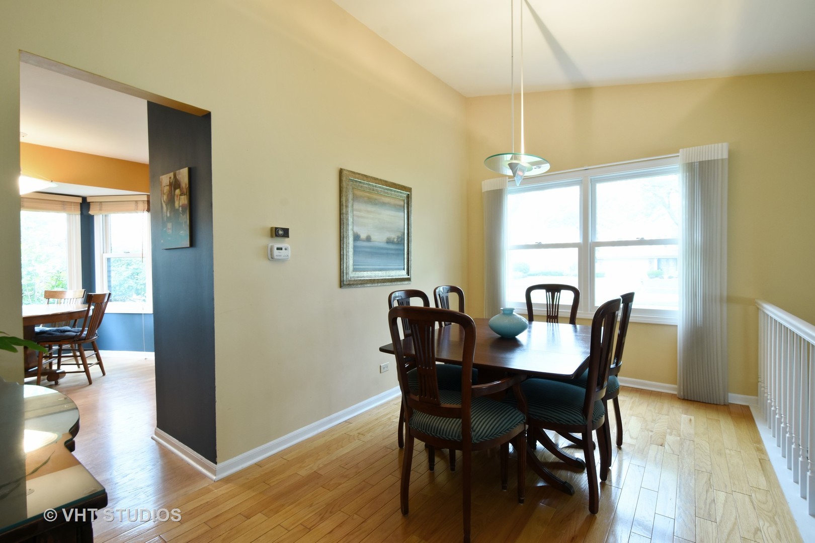 1320 Devonshire Road Buffalo Grove, IL 60089 - Photo 8 of 25 a view of a dining room with furniture window and wooden floor