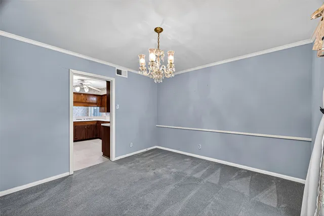 a view of a room with a cabinet and cabinet