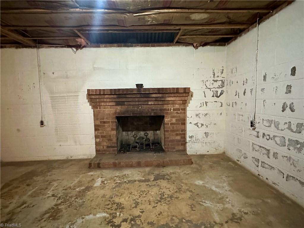 549 Conrad Road Lewisville, NC 27023 - Photo 34 of 46 Basement Fireplace