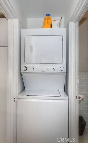 a view of house with yard and swimming pool