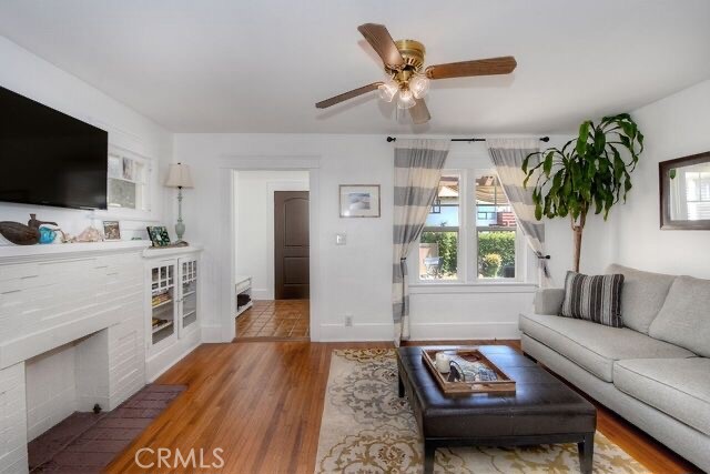 372 Jasmine Street Laguna Beach, CA 92651 - Photo 4 of 20 a living room with furniture and a flat screen tv