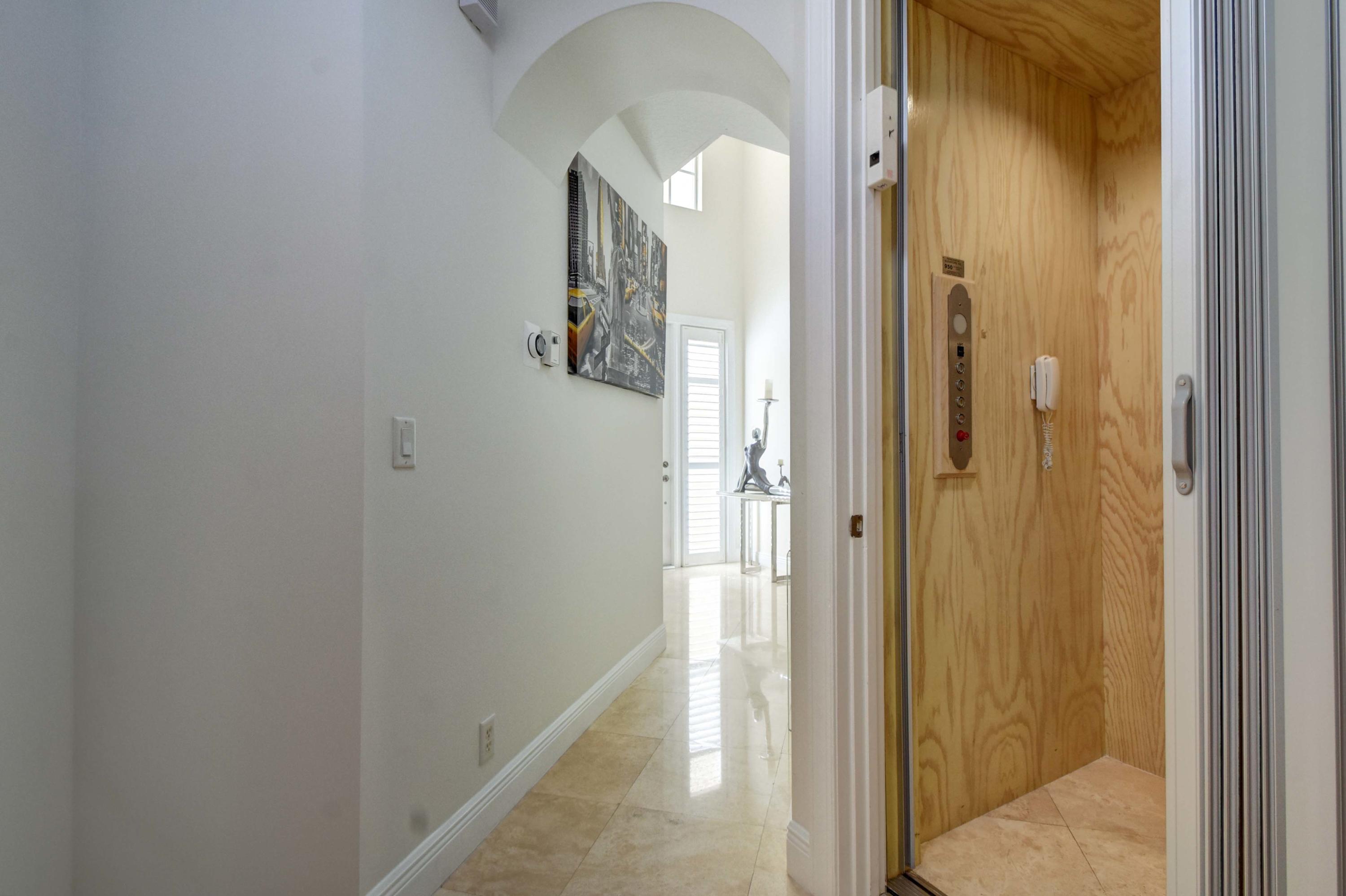 5535 Northeast Trieste Way Boca Raton, FL 33487 - Photo 5 of 51 PERSONAL LIFT