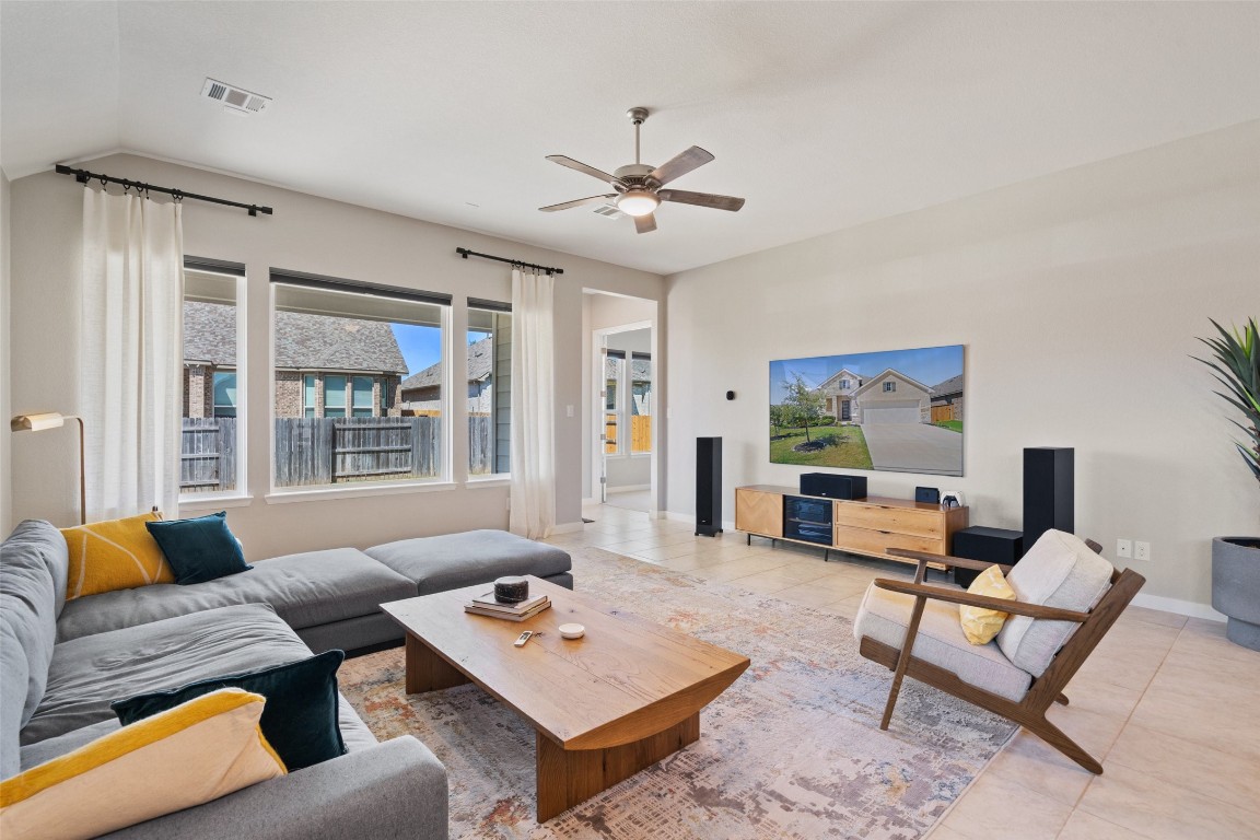 a living room with furniture and a window