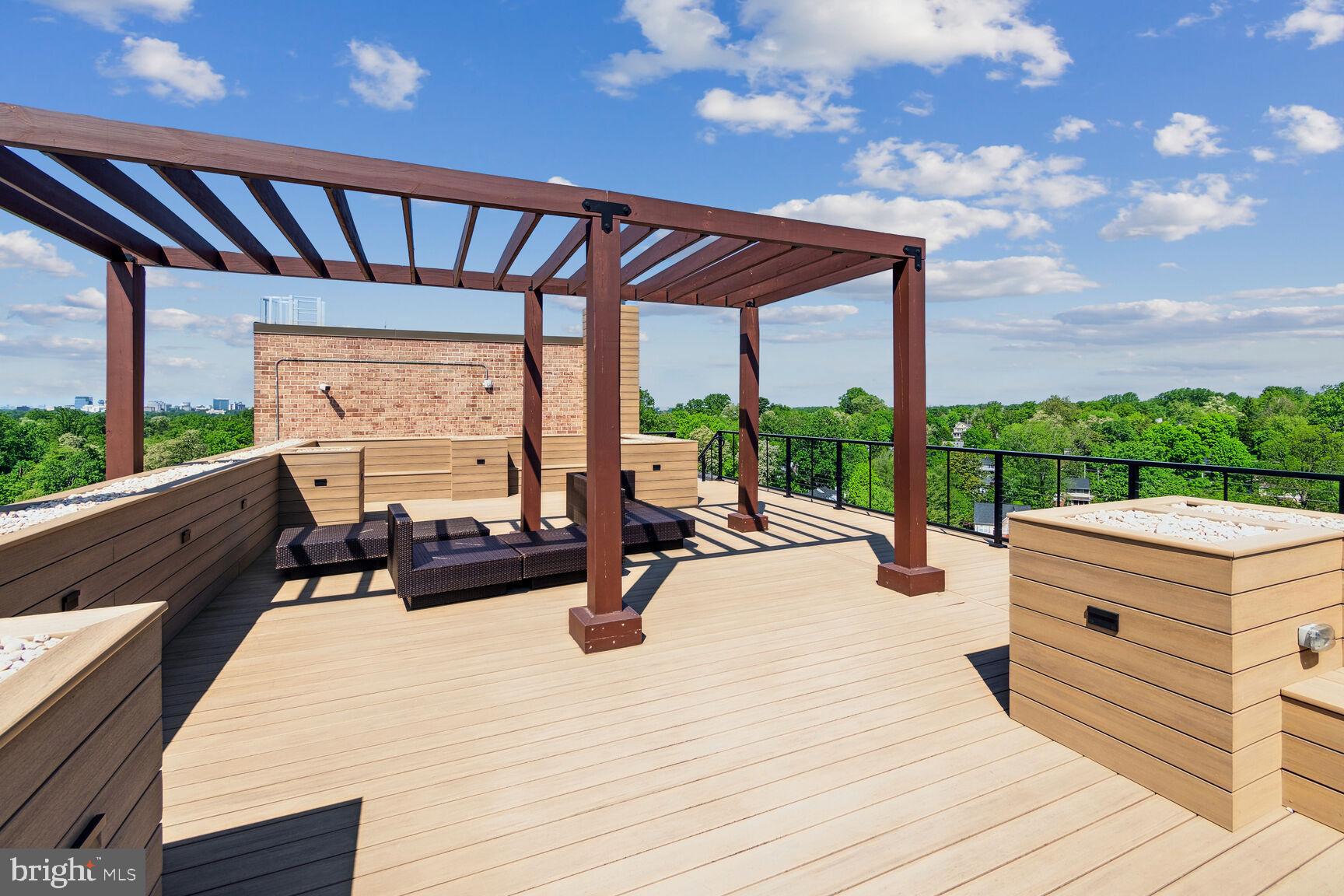 1900 Lyttonsville Road, Unit 702 Silver Spring, MD 20910 - Photo 18 of 20 a view of swimming pool with outdoor seating