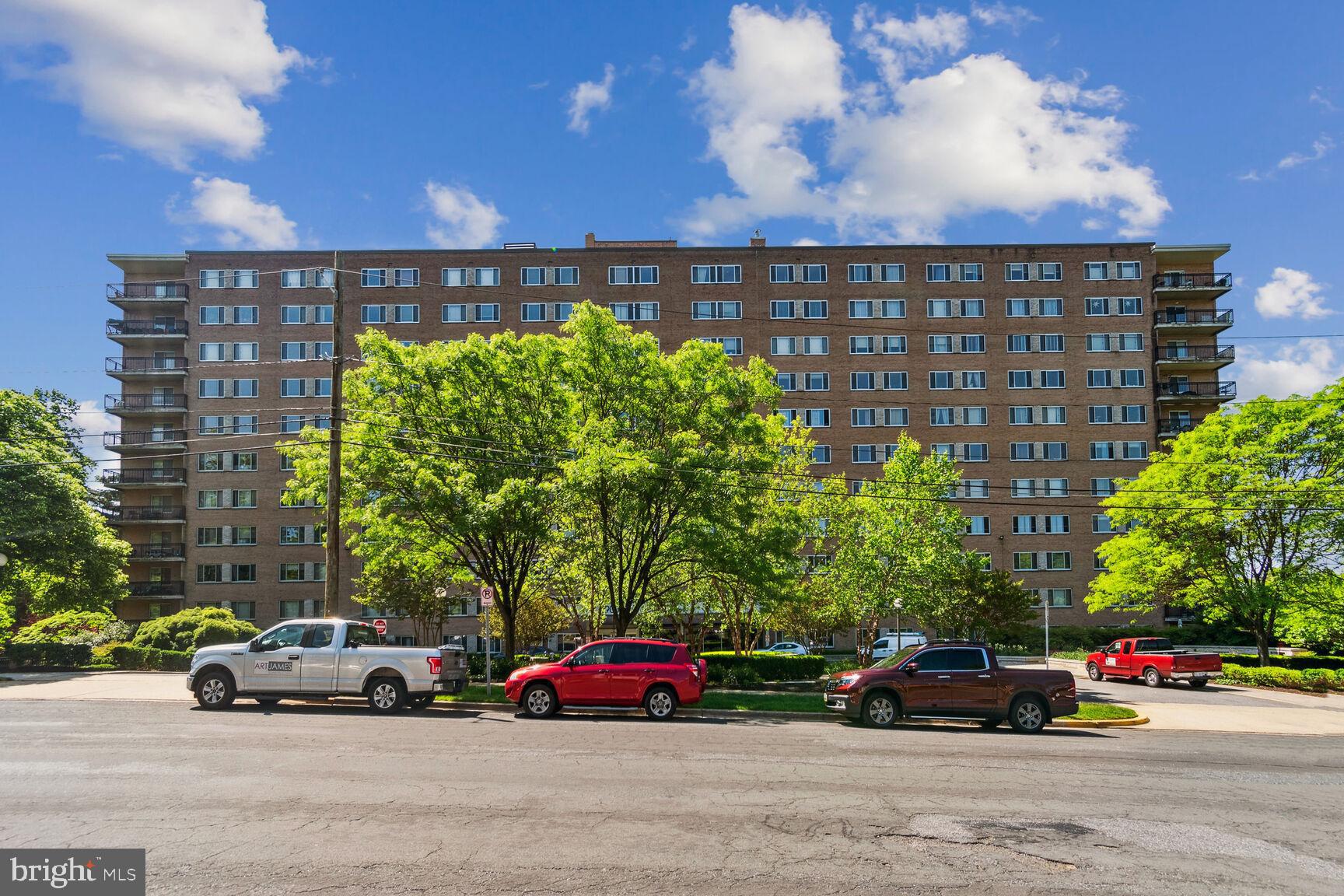 1900 Lyttonsville Road, Unit 702 Silver Spring, MD 20910 - Photo 3 of 20 a cars parked in front of a building