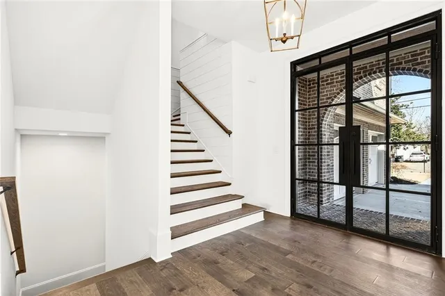 a view of a hallway with staircase