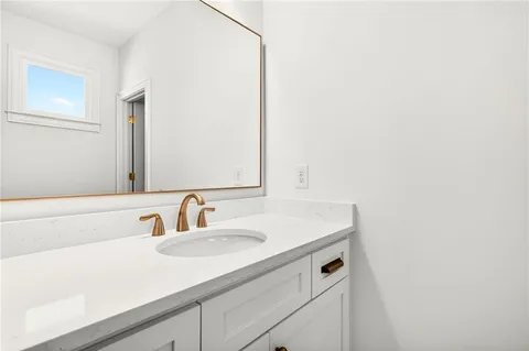 a view of a house with a snow on the road